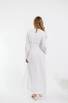 Experience formal elegance in the Brandy Dress. Crafted from a thick fabric and featuring long sleeves, a twist waist tie, a keyhole closure in the back, and subtle details such as hip pockets, this white LDS temple maxi dress is the perfect balance between simplicity and refined sophistication. 100 Polyester Model Measurements: Hips 34” Waist 25” Bust 32” Height 5’6.5, wearing a size small Measurements XS: Bust 32” + stretch | Waist 28” + stretch | Hips 36” | Length 53” S: Bust 34” + stretch | Brandy Dress, Lds Temple Dress, Bridesmaid Tops, Stretch Hips, Temple Dress, Lds Temple, Thick Fabric, Man Swimming, Romper Pants