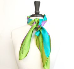 "Size: 30\" x 30\" Colors: Pierre Cardin JEUNESSE vibrant graphic daisy silk scarf, olive green, pink, lime and aqua Material: silk twill Condition: Excellent Hem: hand-rolled Make: Pierre Cardin Made in France Pierre Cardin Signature in the corner. Part of the Jeuness youth line. See all our Pierre Cardin scarves: https://etsy.me/2YKJUk4 All scarves in this shop are hand-washed in organic biodegradable soap with organic lemon oil and sometimes vinegar in cold water and pressed on a cool iron se Green Chic Silk Scarves, Chic Green Silk Scarf For Spring, Chic Green Silk Scarves, Chic Green Silk Scarf Gift, Chic Green Silk Scarf For Gift, Green Scarf As Spring Gift, Green Scarf For Spring Gift, Chic Green Scarf For Gift, Green Scarves For Spring Gift