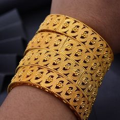 Afraic Jewelry- 24k 1Pcs Gold Color Bangles For women African bridal Bangles Bracelets Gold wedding gifts Ethiopian Bangles jewelleryModel Number:3256801599135949Our product is a relatively high-end product, the gold plating can be used with confidence. It is a practical product for your party wedding birthday party. Gold jewelry makes your life more fun and beautiful. We have been working hard to dear. Provide more and better products Marriage Bangle With Intricate Design, Gold Bangle Bridal Sets As Gift, Gold Bridal Bangle Set For Gift, Jewellery Model, Ethiopian Jewelry, Moroccan Jewelry, Bangles For Women, Bridal Bangles, Bangles Bracelets