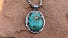 This good looking turquoise and sterling pendant necklace is in good vintage condition with age appropriate light wear.  The sterling rope necklace was made in Italy and the turquoise pendant was Native American made.  I'm unsure of the artisan, it's signed H B.  From the top of the bail to the bottom of the pendant it measures 1 15/16 inches and is 1 1/4 inches across at the widest point.  The sterling chain measures 20 inches and combined with the pendant weighs 35 grams.  The pendant and the Vintage Turquoise Necklace With Round Pendant, Vintage Oval Turquoise Necklace With Large Pendant, Untreated Vintage Turquoise Necklace, Vintage Turquoise Necklace With Large Pendant, Vintage Untreated Turquoise Necklace, Western-style Turquoise Necklace With Large Pendant As Gift, Vintage Sterling Silver Turquoise Necklace, Nickel-free, Blue Nickel-free Southwestern Turquoise Necklace, Southwestern One-of-a-kind Turquoise Necklace