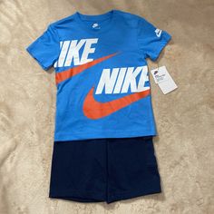 Nike Boys Outfit Size 7. Short Sleeve Shirt And Shorts. Blue Shirt And Navy Shorts. Brand New! Sporty Blue Cotton Sets, Blue Cotton Sporty Sets, Nike Blue Tops For Playwear, Nike Blue Cotton Shorts, Light Blue Casual Sets For Playwear, Blue Shorts For Playwear In Spring, Blue Playwear Shorts For Spring, Blue Short Sets For Spring, Nike Blue Cotton Sets