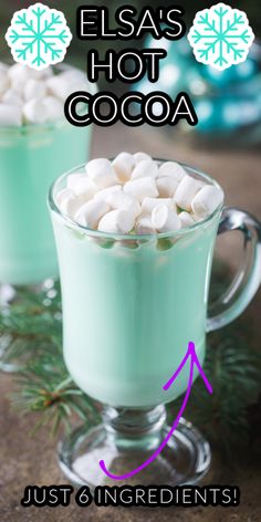 two glasses filled with hot cocoa and marshmallows