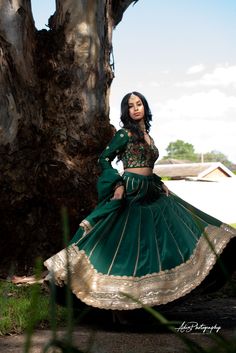 Emerald Green Lehenga Set from Gamila Collection – Panache Haute Couture Green Anarkali Set With Gold Embroidery, Wedding Long Sleeve Sharara With Gold Embroidery, Festive Green Sets With Gold Embroidery, Green Anarkali With Gold Embroidery, Long Sleeve Lehenga With Intricate Embroidery For Eid, Traditional Wedding Sets With Embroidered Sleeves, Traditional Silk Lehenga With Gold Embroidery, Traditional Ceremonial Lehenga With Gold Embroidery, Green Sets With Gold Embroidery In Traditional Drape