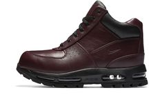 The Nike Air Max Goadome has all the benefits of a winterized boot, but also the comfort of the Nike Air Max cushioning system.  Built for tough terrain and bad weather, this silhouette features a waterproof, full-grain leather in burgundy.  Black provides subtle detailing on the collar, laces, and sole.  Proving the sneaker boot can battle the elements, its durable sole comes equipped with a lug tread pattern for traction and durability.  Adding comfort to the Nike Air Max Goadome sneakerboot i Buy Nike Shoes, Burgundy Boots, Nike Boots, Mens Boots Casual, Burgundy Shoes, Stadium Goods, Mens Nike Air, New Nike Air, New Sneakers