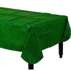 a green table cloth with black legs