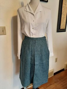 "Mid Century Womens Office/Career Wool A-Line/Pencil Skirts Size S-M/Vtg Lot 4 Wool Skirts Very Good Wearable Condition. Came From An Estate Sale And Need To Be Cleaned From Being Stored. Knee Length Or Slightly Longer Depending On Height. Fairly Soft Wool Fabric/Not Scratchy Lavender Lined Kerrybrooke Pencil Skirt Wool/Acetate Lining 1\" Waistband/Lavender 7\" Side Metal Zipper/1 Button Top Stitching and Front Kick Pleat (1 Tiny Hole Inside Pleat) Waist 27\" Hips 40\" length 26\" Black/Cream/Gr Vintage Fall Skirt, Vintage Long Skirt With Relaxed Fit, Vintage Lined Skirt For Fall, Vintage Relaxed Fit Skirt For Spring, Vintage Relaxed Skirt For Spring, Classic Lined Skirt For Daywear, Retro Relaxed Fit Skirt For Fall, Retro Spring Daywear Bottoms, Retro High Waist Skirt For Work