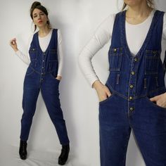 Overall pants jumpsuit Brand: Basin street blues Size:  n/a Measurements: From armpit to armpit: 47 cm (18.50'') Waist: 46 cm x2 (18.11'' x2) Overall length: 132 cm (51.96'') Model in the photos is size 8UK/4US; 164 cm/5'5''  Material: n/a (cotton) Very good vintage condition (2 marks of a white thread) It's NOT NEW mass produced item. It's a vintage piece - please do not expect perfect-like new condition (unless it's stated like this) - accept and hear the stories that comes with this unique vi Retro Denim Blue Overalls, Dark Wash Denim Overalls With Button Closure, Vintage Dark Wash Overalls With Pockets, Blue Jean Overalls, Overalls Vintage, Non-stretch Blue Denim Overalls, Non-stretch Medium Wash Denim Overalls, Jean Overalls, Dark Wash Denim