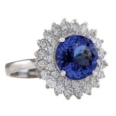 Stamped: 14K White GoldTotal Ring Weight: 6.3 GramsRing Length: N/ARing Width: N/AGemstone Weight: Total Natural Tanzanite Weight is 3.62 Carat (Measures: 9.32x9.32 mm)Color: BlueDiamond Weight: Total Natural Diamond Weight is 1.26 CaratColor: F-G, Clarity: VS2-SI1Face Measures: 17.30x16.70 mmSku: [702297W] 14k White Gold Diamond Ring, Tanzanite Diamond Ring, Gold Diamond Ring, White Gold Diamond Rings, Natural Tanzanite, White Gold Diamonds, Sapphire Ring, Natural Diamonds, Gold Diamond