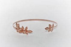 This beautiful choker is made out of an intricate and detailed selection or rose and rose leaves, all soldered securely on each side, on a flexible and adjustable base. Measurements: The circumference is approximately 12 inch / 30 cm * Comes wrapped in a beautiful gift bag/box.* Available in 14k gold, rose gold or silver plated brass. For updates, new products, one-of-a-kind's, special offers and more-like us on Facebook:https://www.facebook.com/avigailadamjewellery Follow me on Instagram: https Adjustable Rose Gold Metal Choker, Elegant Adjustable Rose Gold Choker, Floral Choker, Beautiful Chokers, Rose Leaves, Adjustable Base, Gold Rose, Or Rose, Gift Bag