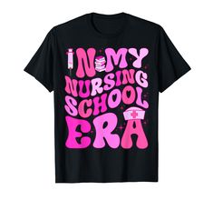 a black shirt with pink lettering that says i am my nursing school era on it