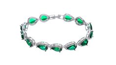 Discover the elegance and allure of the Silver Emerald Green Teardrop Bracelet. Add sophistication to any outfit with its stunning design. Formal Cubic Zirconia Teardrop Bracelets, Formal Teardrop Cubic Zirconia Bracelet, Elegant Green Crystal Bracelets, Elegant Green Crystal Bracelet For Formal Occasions, Formal Silver Teardrop Bracelets, Elegant Green Tennis Bracelet For Party, Jewelry Bracelet, Emerald Green, Cubic Zirconia