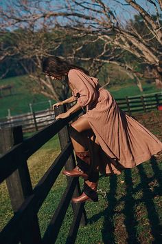 Easy cotton midi dress from our free-est collection featured in a flowy silhouette with a smocked bodice and volume sleeves. * Ruffled neckline * Adjustable tie at bustline * Lined skirt | Oasis Midi Dress by free-est at Free People in Tan, Size: XS Bohemian Midi Dress With Smocked Back For Daywear, Spring Puff Sleeve Midi Dress For Gatherings, Spring Dresses With Elastic Sleeves For Gatherings, Spring Gatherings Ruched Midi Dress, Peasant Dress With Gathered Sleeves For Spring, Spring Peasant Dress With Gathered Sleeves, Billowy Midi Maxi Dress For Daywear, Fall Maxi Length Puff Sleeve Dress, Flowy Midi Dress With Smocked Cuffs For Day Out