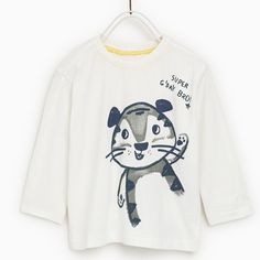 - 100% Cotton - Machine Wash Long Sleeve T-shirt With Character Print For Playtime, White Cotton T-shirt For Playtime, Zara Playful Cartoon Print T-shirt, Long Sleeve T-shirt For Summer Playtime, Casual Long Sleeve T-shirt For Playtime, White Crew Neck T-shirt For Playtime, Long Sleeve Character Print Playtime T-shirt, Graphic Tee Shirt With Cartoon Print, White Graphic Tee With Cartoon Print