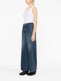 wide-leg jeans from STELLA MCCARTNEY featuring blue, cotton, denim, stonewashed, whiskering effect, wide leg, front button and zip fastening and multiple patch pockets. We've partnered with Good On You — an independent agency that rates how brands perform in relation to their impact on the planet, people and animals, with a multi-criteria rating simplified to a five points scale. In order to be awarded our conscious label, larger brands need to score a minimum of four out of five ('Good'), while Stella Mccartney Jeans, Stella Jeans, Trench Dress, Jeans Wide, Trench Jacket, Cape Coat, Blazer With Jeans, Knitwear Cardigan, Pant Shirt