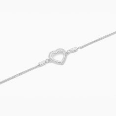 SKU# B-40068-W 9" Adjustable Bolo Chain Diamond Weight 0.05cts Heart Diameter 11.60 mm Thickness 2.30 mm Closure Bolo Finish 14k gold plated sterling silver or in sterling silver. Avoid contact with anything containing derivatives of alcohol. Adjustable Heart-shaped Diamond Jewelry, White Gold Cubic Zirconia Heart Bracelet, Classic White Gold Heart Bracelets, Classic White Gold Heart Bracelet, White Gold Classic Heart Charm Bracelet, Classic Double Heart Promise Jewelry, Classic Heart Shaped White Gold Bracelet, Classic Cubic Zirconia Diamond Bracelet In Heart Shape, Diamond Heart Bracelet In White Gold