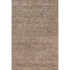 an area rug with brown and white squares on the front, in shades of beige