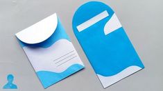 an envelope with a paper cut out of it