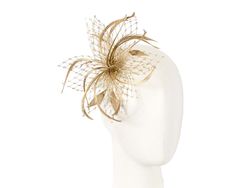 This stunning gold fascinator is hand made by best Melbourne millinery and is mounted on a comb. Our fascinators look great on you for that special occasion like wedding, Melbourne Cup or Ascot. This fascinator is mounted on the comb  Made in Australia Gold Fascinator Wedding, Elegant Fascinator With Pinched Crown For Gift, Elegant Pinched Crown Fascinator Gift, Elegant Headband Fascinator As Gift, Elegant Headband For Royal Ascot Gift, Gold Adjustable Headpiece With Structured Crown, Glamorous Gold Wedding Headpiece, Adjustable Glamorous Gold Headpieces, Elegant Adjustable Gold Mini Hat