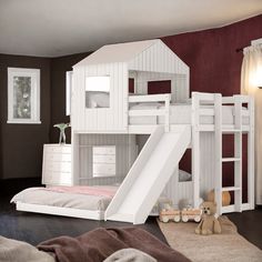 a child's bedroom with bunk beds and a slide