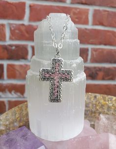 This beautiful pink cross necklace a perfect treat for yourself or a gift for someone special. The cross charm is approximately 1.25" wide and 1" tall.  The cross pendant is made out of Antique silver plated, lead-free, nickel-free, cadmium-free zinc, Austrian crystals. The back side is metal. Comes with an 18" chain with a 2" extender Colors may vary based on screen settings, lighting, etc.  Returns not accepted but please email me with any problems. Items sold in my shop are meant for adults o Pink Cross Necklace, Mineral Necklace, Pink Cross, Necklace Cross, Baptism Gifts, Cross Jewelry, Cross Charms, Austrian Crystal, Box Chain