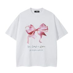 Add some playful style to your wardrobe with our Women's Pink Bow Print T-Shirt. The unique bow print adds a touch of whimsy to any outfit, while the soft and comfortable material keeps you feeling great all day long. Perfect for adding a bit of fun to any casual look. Features: -100% Cotton -Crew Neckline -Pink Bow -Regular fit -Classic style -260g Cute Cotton T-shirt With Bow, Cute Cotton T-shirt With Bow Print, Cute Short Sleeve T-shirt With Pink Bow, Pink Bow Short Sleeve T-shirt, Cute Cotton T-shirt With Pink Bow, Unique Bows, Bow Print, Playful Style, Casual Look