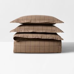 three pillows stacked on top of each other