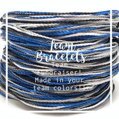 a spool of blue and white thread with the words team bracelets on it