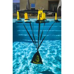 an inflatable buoy floating on top of a swimming pool with blue water