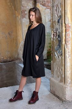 "Black Loose Dress with Long Sleeves, Plus Sizes Available, 7 Color Options This one is a knee long ,black dress. It is loose and breeze on the shoulders with wide sleeves and easy to wear. You can wear it on different types of occasions and events. The good thing about this dress is that you don't have to worry constantly of how it looks,because it adapts to the body structure and it gives you a confidence boost. It is very suitable for bigger sizes as well. ◈ Stylish and chic fashion is our sh Black Long Sleeve Midi Dress In Relaxed Fit, Black Long Sleeve Midi Dress Relaxed Fit, Black Relaxed Fit Midi Dress With Long Sleeves, Black Relaxed Fit Midi Dress For Fall, Oversized Black Midi Dress For Daywear, Black Knee-length Long Sleeve Summer Dress, Black Midi Dress With Relaxed Fit, Casual Black Long Sleeve Dress For Summer, Casual Black Long Sleeve Summer Dress