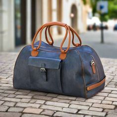 Italiano Duffle Bag - Premium Luxury Travel from Que Shebley - Shop now at Que Shebley Leather-lined Tote Travel Bag For Trips, Luxury Gym Bag With Luggage Sleeve For Travel, Luxury Travel Gym Bag With Luggage Sleeve, Luxury Satchel Duffle Bag For Trip, Overnight Tote Duffle Bag With Luggage Sleeve, Modern Duffle Bag With Leather Handles For Overnight Trips, Duffle Bag With Luggage Sleeve For Overnight Trips, Modern Travel Bag For Weekend Trips With Leather Lining, Weekend Travel Tote With Leather Lining