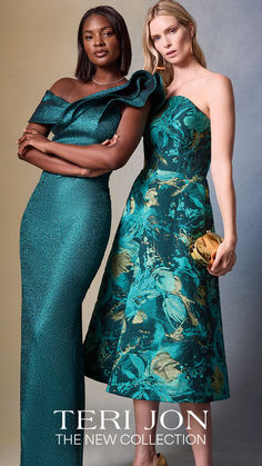 two women standing next to each other posing for the camera, one wearing a green dress