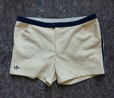 Cool vintage Adidas tennis shorts. 2 pockets, embroidered logo and 3 stripes The fabric is slightly elastic Please note 2 stains near pocket(see picture) Size L(not less, as it is not thought for belt) Waist 54 cm(flat measurement(for round X2)) Full length 36 cm In seam 13 cm Summer Tennis Bottoms With Pockets, Tennis Bottoms With Built-in Shorts In Cotton, Tennis Bottoms With Built-in Shorts, Cotton Tennis Bottoms With Built-in Shorts, Summer Cotton Tennis Shorts, Cotton Tennis Shorts, Vintage Athletic Wear, Tennis Adidas, Short Adidas