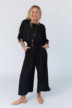 Get comfort and ease without sacrificing your unique boho style with the Carolina Comfy Wide Leg Jumpsuit! You will love this jumpsuit with all of your soul because it features: Comfortable, solid, stretch fabric Relaxed and loose jumpsuit silhouette Classic round neckline Elbow-length Dolman puff sleeves with so cute functional drawstring closure details Flattering and comfortable elastic waistband Cute wide pant legs with convenient side pockets Effortless all-in-one boho outfit pair with: Flo Oversized Jumpsuit, Three Bird Nest, Boho Outfit, Three Birds, Loose Jumpsuit, Padded Bralette, Flowy Pants, The Nest, Wide Pants