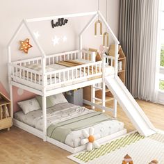 a white bunk bed with a slide in the middle