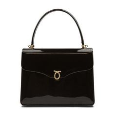 Royale Handbag in Patent Black/BlackOf true royal pedigree, these soft leather handbags are a favorite of H.M. Queen Elizabeth II. An elegant blend of linear and curved forms, this piece is wonderfully British. Designed and manufactured by Launer London, this piece is crafted to the highest possible standards. Only the finest calfskin leathers sourced from Italy are used to create this piece. The interior is equally striking and features fine Italian suede linings.While we do not stock this piec Launer London, Modern Handbag, Statement Handbag, Soft Leather Handbags, Handbag Collection, Vintage Bags, Small Leather Goods, Black Handbags, Queen Elizabeth