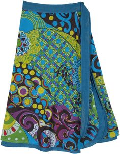 A blue-toned wrap skirt with a beautiful and bold floral print and colorful embroidery details.  This wrap skirt has two layers with the bottom layer as stonewashed blue and the upper layer printed floral; creating a flowing look and an artistic groove. #tlb #WrapAroundSkirt #Stonewash #beachwrap #Floral #Printed #bohemianfashion #WrapSkirt #HippieSkirt #FloralPrint Hippie Tiered Wrap Skirt For Spring, Spring Hippie Wrap Skirt, Spring Hippie Long Wrap Skirt, Hippie Wrap Skirt With Lined Skirt For Spring, Hippie Lined Wrap Skirt For Spring, Hippie Long Wrap Skirt For Spring, Hippie Style Lined Wrap Skirt For Spring, Summer Bohemian Cotton Wrap Skirt, Bohemian Cotton Wrap Skirt For Summer