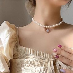 Sweet baroque pearl necklace At first sight, this baroque pearl choker can make people directly feel the meaning of sweet, delicate, and elegant. If you're looking for a real pearl necklace to go with your off-the-shoulder dress, square-neck tee, or anything without a collar, this is the right pearl necklace for women to wear. With a small but noticeable size, this 5-6mm baroque freshwater pearl necklace looks shiny and personal. The baroque pearl choker also comes with an eye-catching design: a Moonstone Necklaces, Necklaces Gemstone, Chokers Necklace, Natural Pearl Necklace, Real Pearl Necklace, Pearl Gifts, Rings Collection, Gemstone Beaded Necklace, Baroque Pearl Necklace