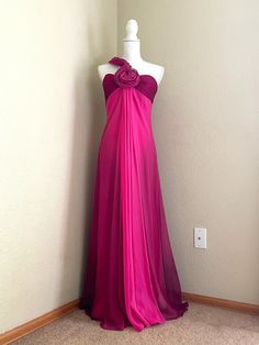 "Excellent Vintage Condition - Pink Ombre One-Shoulder Dress w/ Rose Gorgeous, flowy dress for any occasion! The silhouette helps creates a fitted/lengthy figure. The ombre fabric shows different shades of pink throughout the garment in a subtle yet beautiful way. Overall this gown is in excellent vintage condition. There are no spots/stains/holes on the gown.  Labeled as size 8 Measurements: Chest: 32\" Waist: 28\" Length: 70.8\"" Pink Pre-draped Evening Dress For Cocktail, Pink Flowy Floor-length Evening Dress, Pink Pre-draped Floor-length Evening Dress, Pre-draped Pink Silk Evening Dress, Flowy Pink Chiffon Evening Dress, Formal Fitted Ombre Dress, Elegant Ombre Cocktail Dress, Pink Pre-draped Formal Dress, Ombre Sleeveless Evening Dress