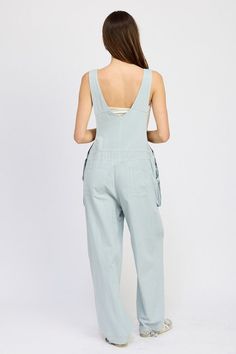 Elevate your casual wardrobe with our Oversized Cargo Overall, expertly crafted from 100% cotton for maximum comfort and durability. This piece redefines utility chic with its generous, relaxed fit that allows for easy movement and layering. The design features multiple functional pockets, perfect for carrying essentials while maintaining a stylish edge. Its versatile nature makes it suitable for various occasions, from laid-back weekends to more adventurous outings. Whether paired with a simple Spring Cotton Washed Overalls, Spring Washed Cotton Overalls, Spring Cotton Overalls With Washed Detail, Spring Overalls With Relaxed Fit For Everyday, Casual Light Wash Cotton Overalls, Relaxed Fit Cotton Overalls, Casual Relaxed Fit Overalls With Side Pockets, Utility Cotton Overalls With Patch Pockets, Utility Cotton Overalls With Pockets