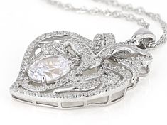 Bella Luce ® white diamond simulant 6.73ctw oval and round, rhodium over sterling silver floral heart pendant with chain. Measures approximately 1.50"L x 0.19"W and has an 18" singapore chain with a 2" extender and lobster claw closure. The diamond equivalent weight is 4.01ctw. Oval Fine Jewelry For Valentine's Day, Mother's Day Cubic Zirconia Jewelry With Prong Setting, Oval Cubic Zirconia Jewelry For Valentine's Day, Oval Center Stone Jewelry For Valentine's Day, White Oval Pendant With Prong Setting, Valentine's Day Oval Center Stone Jewelry, Silver Heart Pendant With Prong Setting, Oval Diamond Jewelry For Valentine's Day, Silver Heart Pendant Jewelry With Prong Setting