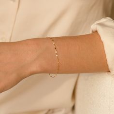 The Twisted Lace Chain Bracelet is an absolute must-have for your wrist. It’s dainty and adds just the right amount of feminine sparkle you have been looking for. If you’re looking for a bracelet you can wear every day - you've found it! It looks amazing on its own and dainty enough to pair with your other favorite bracelets. Crafted of 14k solid gold so you can wear it 24/7 - even to the gym, shower, and to sleep. This bracelet is a sparkly treasure that you'll never want to take off! DETAILS 1 Delicate Gold Bracelet Classy, Permanent Bracelet, Delicate Gold Bracelet, Dainty Gold Bracelet, Permanent Jewelry, Solid Gold Bracelet, Jewelry Accessories Ideas, Simple Bracelets, Pretty Jewelry