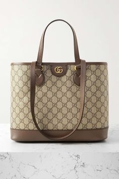 GUCCI Ophidia Tess embellished leather-trimmed printed coated-canvas shoulder bag | NET-A-PORTER Gucci Bags Handbags, Gucci Ophidia Bag, Tote Bag Outfit, Gucci Handbags Outlet, Shop Gucci, Accessorize Bags, Winter Bags, Gucci Tote Bag, Gucci Ophidia