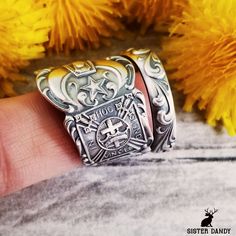 A rare antique sterling silver Masonic spoon was transformed into a stunning piece of wearable art. Freemasonry is a fraternal organization that emphasizes moral and philosophical teachings, rituals, and symbols to promote personal development and social betterment among its members. This ring features symbolism of Masonry. This piece would make a lovely statement piece or a unique gift. This ring is made from a vintage sterling silver spoon, 925, nickel-free. This ring will be adjusted to the size you request but it can easily be tightened or loosened at home should you want a different fit. As these are antique items, there may be minor wear and tear from its past life. Some rings may have engravings or markings. We do not offer any customization or marking removal at this time. Spoon ri Antique Engraved Silver Ring, Antique Oxidized Finish Engraved Ring As Gift, Antique Sterling Silver Engraved Ring, Vintage Silver Engraved Ring With Oxidized Finish, Vintage Engraved Sterling Silver Ring In Antique Silver, Unique Silver Rings With Antique Finish, Vintage Engraved Ring With Oxidized Antique Silver Finish, Vintage Engraved Ring In Antique Silver With Oxidized Finish, Sterling Silver Rings With Antique Finish As Gift