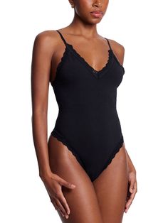 What do you get when you combine a thong with a leggy bodysuit? A one-piece wonder. This soft Supima® Cotton bodysuit is a soft and comfortable cotton layer that’s easy to wear and feel good in. Style it to go out or wear it at home with sweats. Women's sleepwear, lingerie and more, from Hanky Panky. Stretch Bodysuit With Lined Body For Loungewear, Chic Seamless Bodysuit For Loungewear, Solid Loungewear Bodysuit With Lined Body, Lined Loungewear Bodysuit In Solid Color, Solid Color Loungewear Bodysuit With Lined Body, Solid One-piece Bodysuit For Loungewear, Solid Color One-piece Bodysuit For Loungewear, Elegant Seamless Bodysuit For Loungewear, Chic One-piece Bodysuit For Loungewear