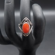 "This vintage sterling silver ring feautures a orange glass cabochon set in sterling silver. It is a size 6 and marked \"Sterling\" on the inside of the ring. The top measures 1\" L x 1\" W" Vintage Sterling Silver Rings, Kingston, Vintage Sterling Silver, Sterling Silver Ring, Silver Ring, Sterling Silver Rings, The Top, Jewelry Rings, Ring Size