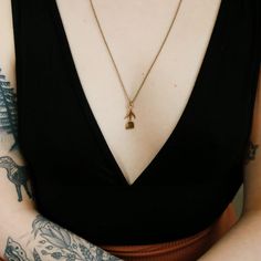 Your style just got a whole lot sweeter with the Flora necklace ✿ Choose from a tulip or daisy charm for a piece that's always in bloom! MATERIAL & DETAILS Charm available in brass or sterling silver Brass Charm on 24" 14K gold fill chain Silver Charm on 24" sterling silver chain Minimalist 14k Gold Filled Jewelry With Flower Charm, Dainty 14k Gold Filled Charm Necklaces For Everyday, Dainty Everyday Charm Necklaces In 14k Gold Filled, Brass Initial Pendant Necklace With Charms, Everyday Brass Pendant Jewelry, Delicate Everyday Necklaces With Charms, Dainty Yellow Gold Brass Charm Necklace, Delicate Everyday Charm Necklace In Recycled Gold, Dainty Gold Necklace For Everyday Use