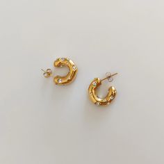 Not just any jewelry, these Sparkle Gold Plated Copper Hoop Earrings with Cubic Zirconia are high quality and versatile enough to go with any outfit. Add a splash of elegance and style to your wardrobe with timeless designs that won't go out of fashion: they'll have you feeling fancy AF! Chic Gold-tone Gift Earrings, Elegant Tortoiseshell Hoop Earrings For Gift, Tortoiseshell Hoop Earrings For Gift, Elegant Gold-tone Brass Huggie Earrings, Luxury Tarnish-resistant Brass Hoop Earrings, Jewelry Product Shots, Clean Cotton, Open Hoop Earrings, Water Based Ink