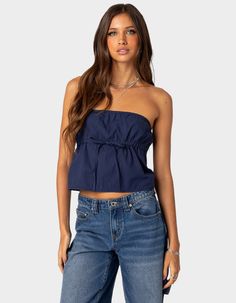 This Strapless Top Is Levels Over Any Other. It's Simple With A Bit Of Something Extra With A Cute Tie Front Detail To Level Up Your Next Outfit. Tube Top. Strapless Design. Under Bust Tie Strap. 100% Cotton. Model Wears Size S. Model Height Is 5'7. Item Care: Machine Wash At Maximum Of 30ºc, Do Not Bleach, Tumble Dry Low, Iron At A Maximum Of 110ºc, Do Not Dry Clean. | Edikted Reva Strapless Top Blue Tube Top, Fall School, Wardrobe Edit, Next Clothes, Strapless Tops, School Fits, Fit Inspo, Cute Tops, Cotton Tops