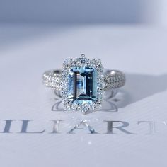 clio-https://clio.giliarto.com/ring/1/572 Center Stone Engagement Ring, Disney Engagement Rings, Aquamarine Ring Vintage, Halo Engagement Ring Emerald, Blue Diamond Engagement Ring, Aquamarine Birthstone, Moissanite Engagement Ring Halo, Blue Engagement Ring, Stone Engagement