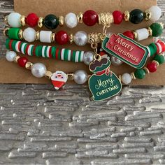 Set Of 4 Merry Christmas Beaded Holiday Charm Bracelets New Merry Christmas Charms, Santa Claus, Seed Beads, Pearls Christmas Party Beaded Bracelets, Christmas Multicolor Beaded Bracelets, Festive Multicolor Bracelets For Christmas, Multicolor Festive Bracelets For Christmas, Holiday Festive Jewelry With Colorful Beads, Festive Christmas Beads With Round Shape, Festive Holiday Jewelry With Colorful Beads, Beaded Jewelry For Christmas Holiday, Green Bracelets For Christmas Party